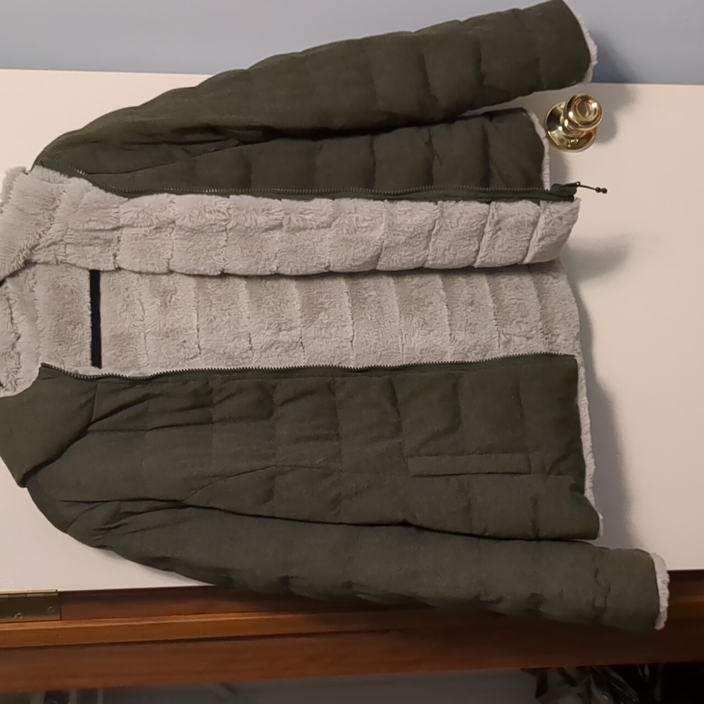 Women's size medium fur lined green winter coat.
